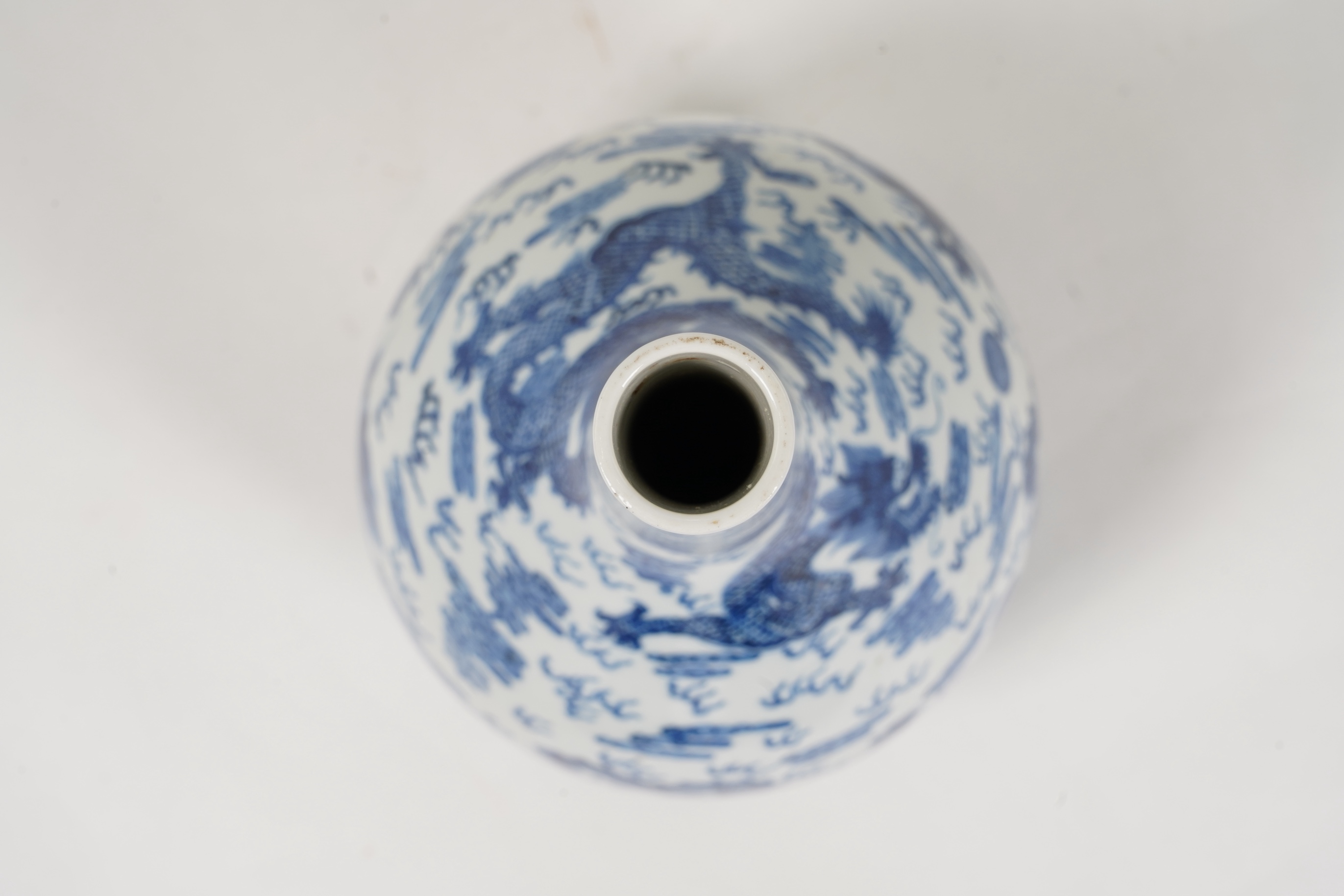 A Chinese blue and white 'dragon' bottle vase, 19th/20th century